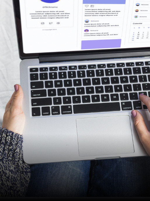 person-using-laptop-bed